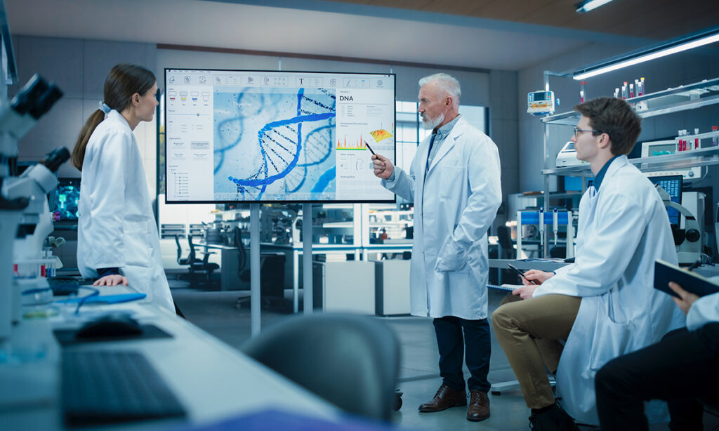 Biotech startup team discussing clinical and scientific data for drug development strategy